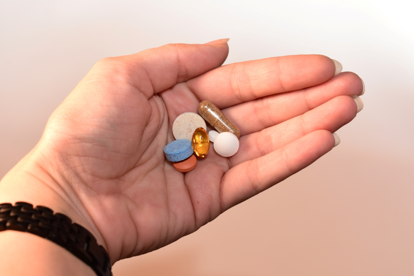  a person holding medicines