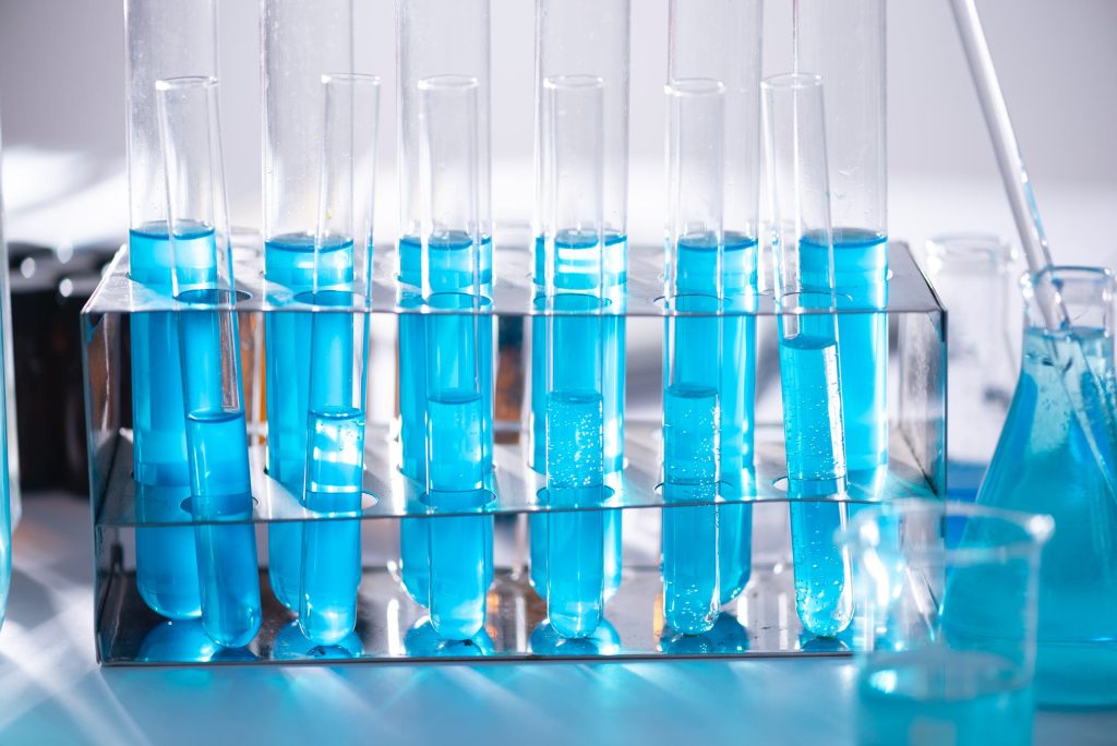 test vials filled with blue liquid