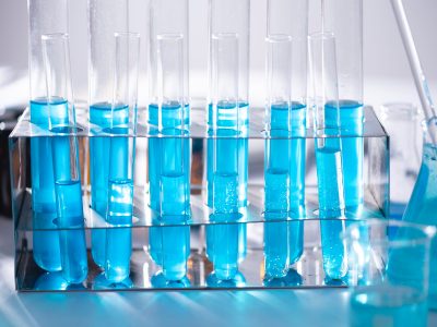 test vials filled with blue liquid