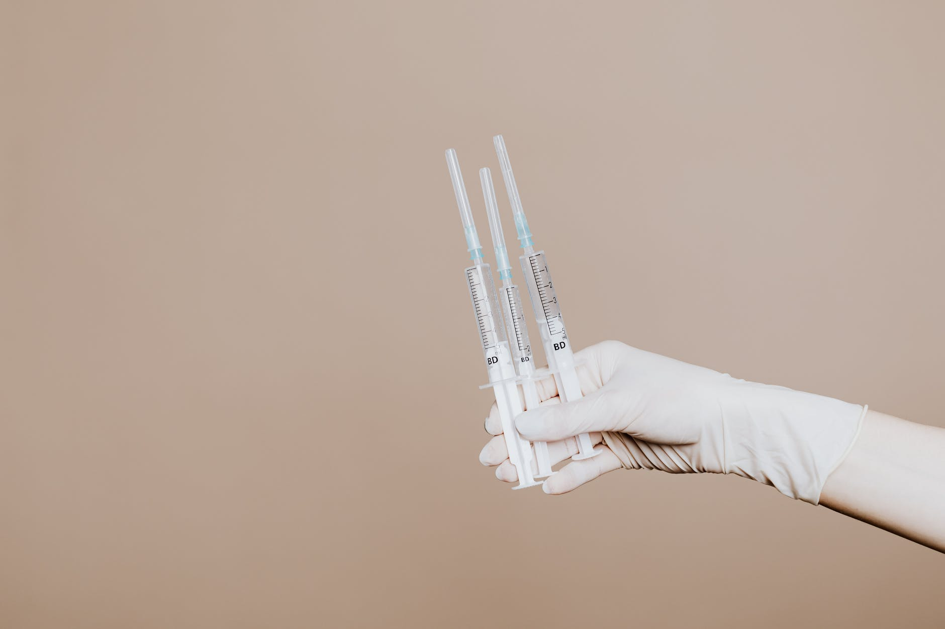 a person holding syringes with antihemophilic factor