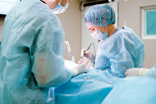 Doctors performing a liver transplant