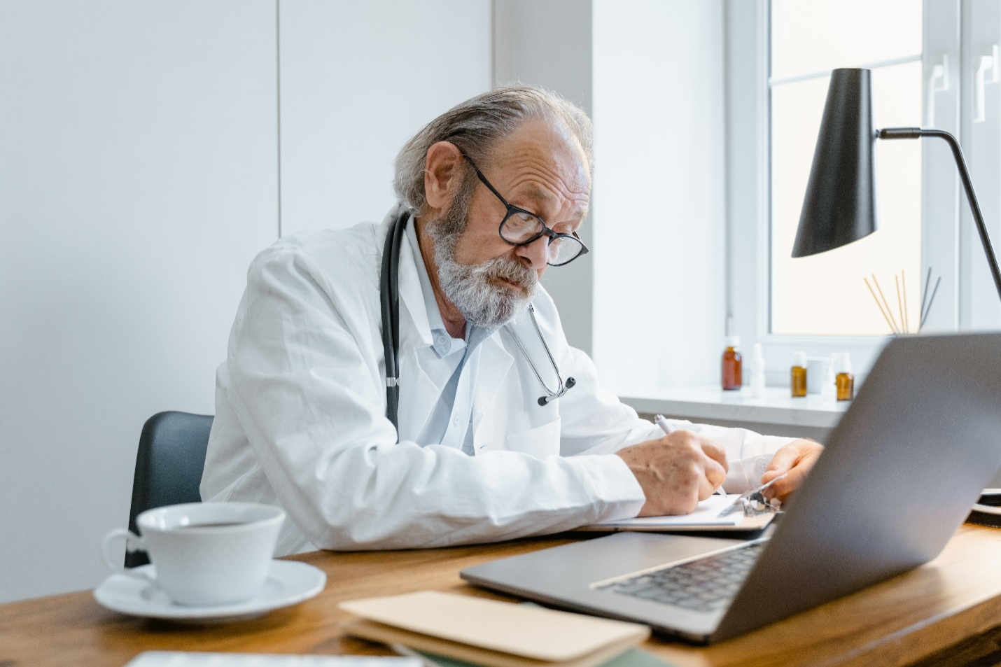 A doctor writing a prescription 