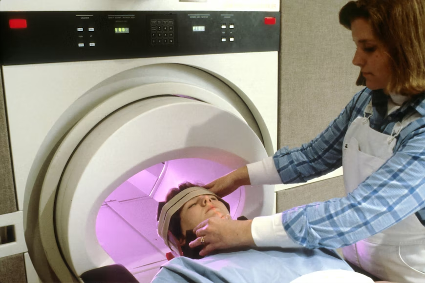 A woman getting an MRI.