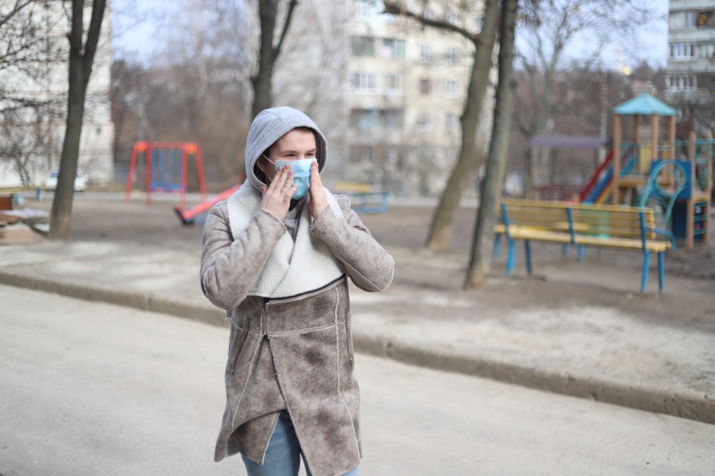 a person with a mask to prevent developing illnesses