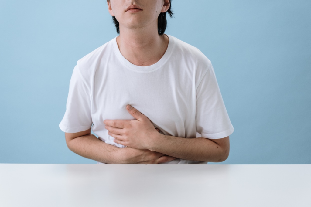 Man suffering from unknown reasons for stomach ache