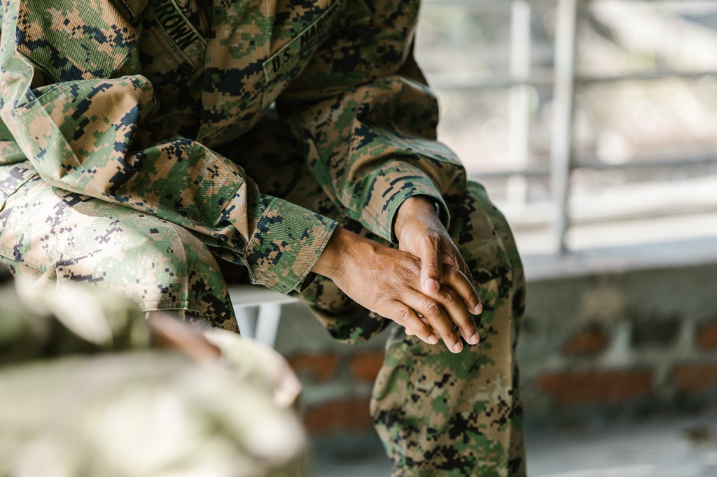 a veteran sitting down