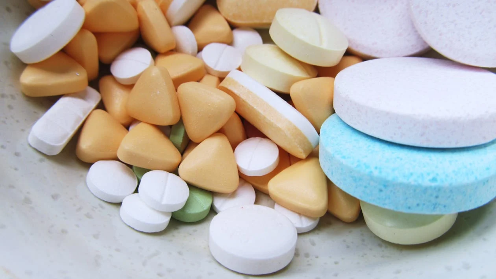 A close-up of medication tablets