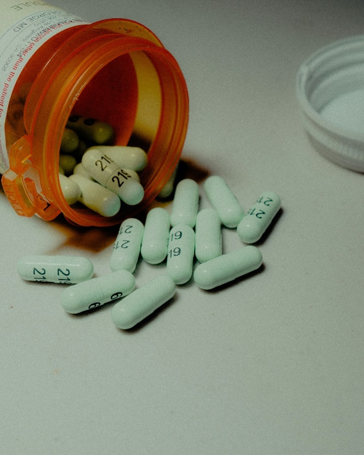 Several tablets laid out on a white platform.