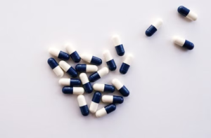 Prescription pills arranged on a table for medication assistance research