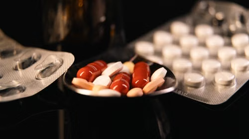 Assorted pharmaceutical pills arranged in blister packs